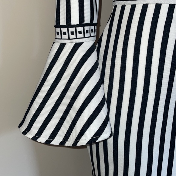 Black and white spandex dress. Shows curves - Picture 2 of 5